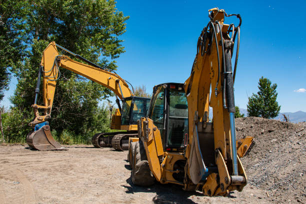 Excavator and Backhoe on site
